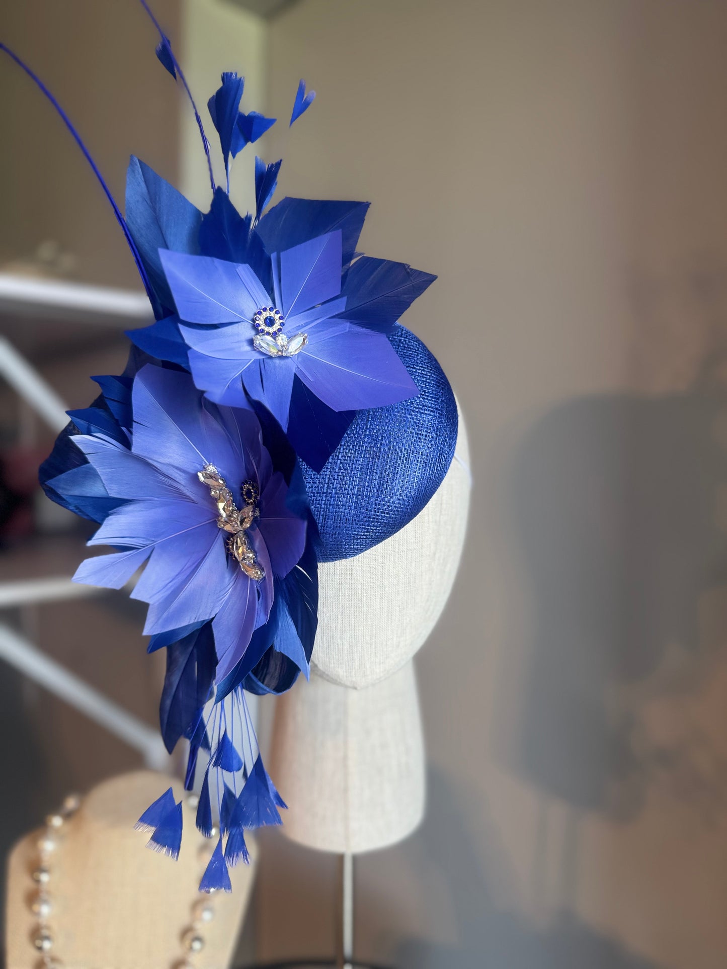 “Lauren” Blue feather statement