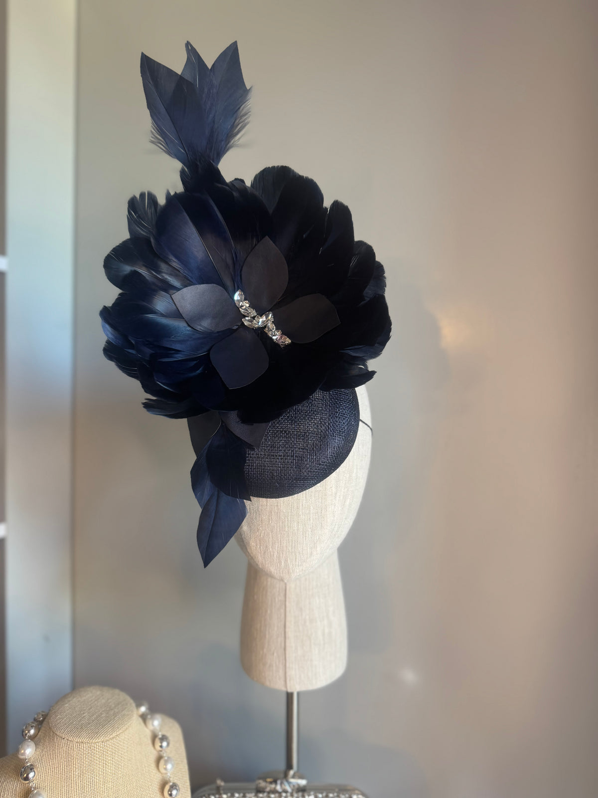 “Alison” Navy feather statement
