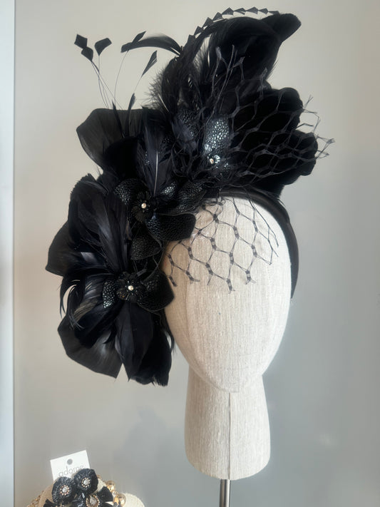 “August” black pleather statement