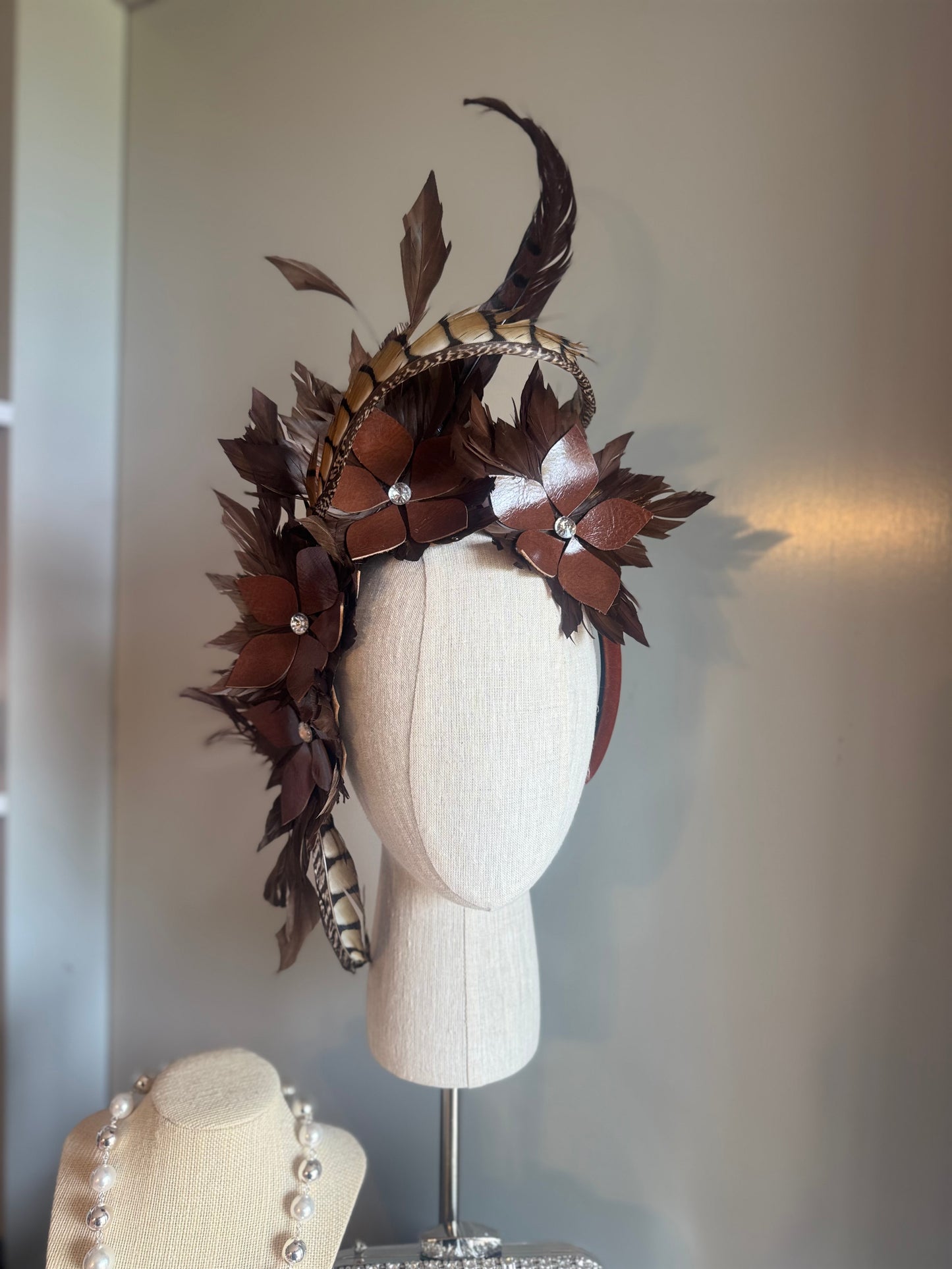 “Tempi” brown feather statement pillbox