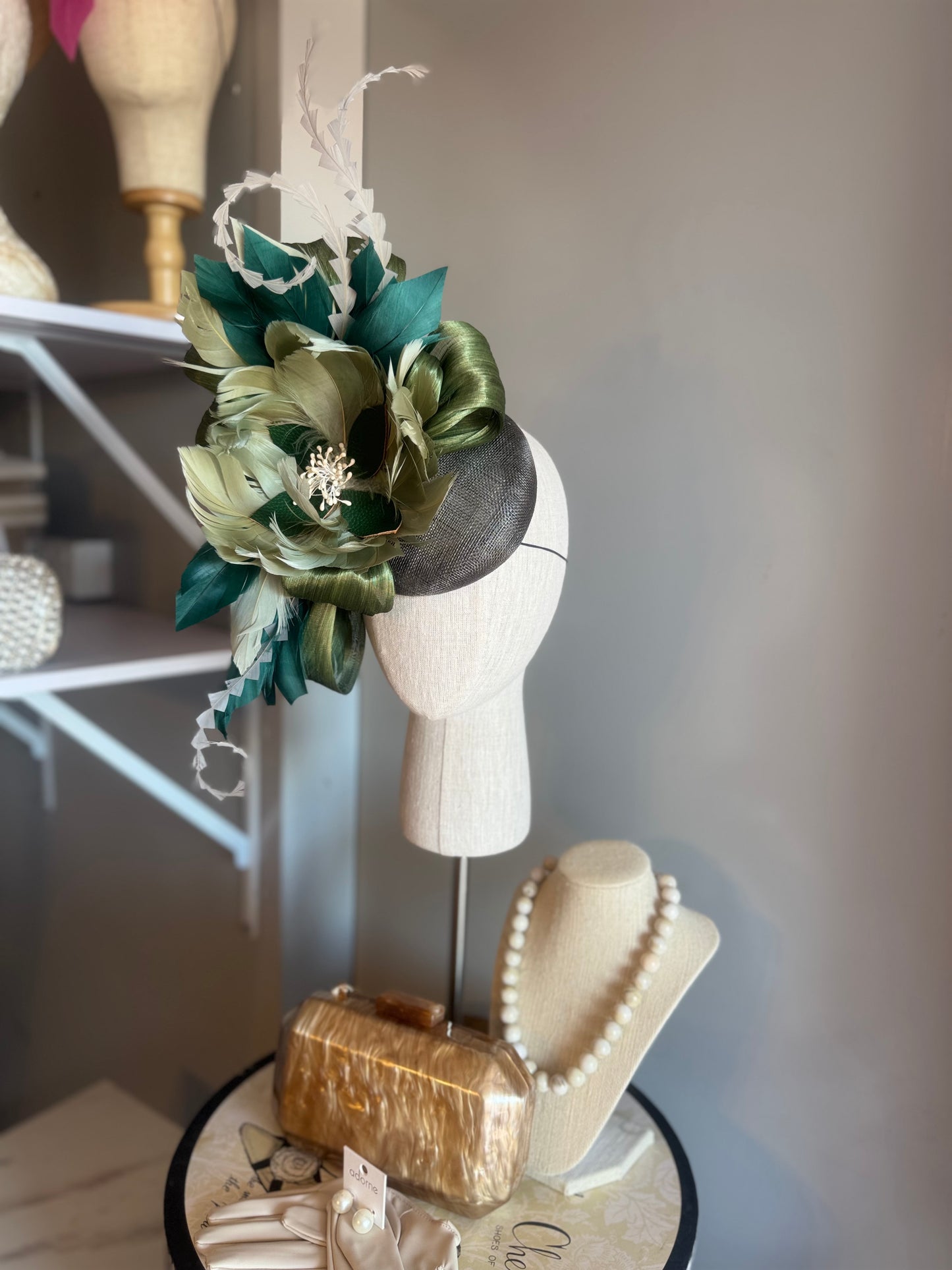“August” green feather statement