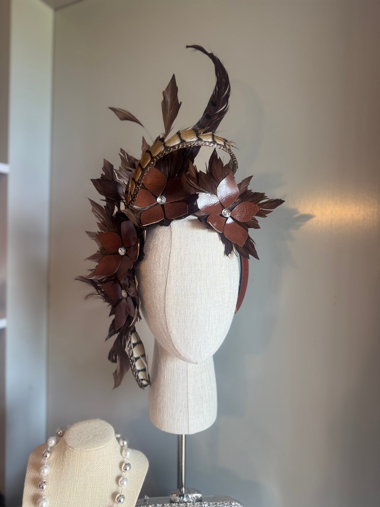 “Tempi” brown feather statement pillbox