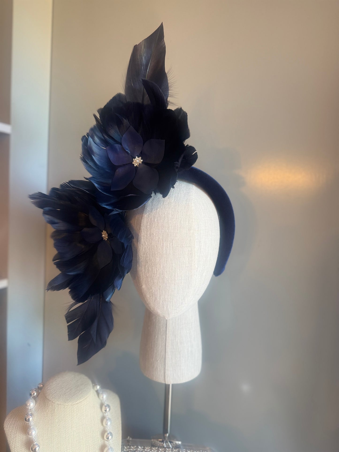 “Maggie” Navy feather statement