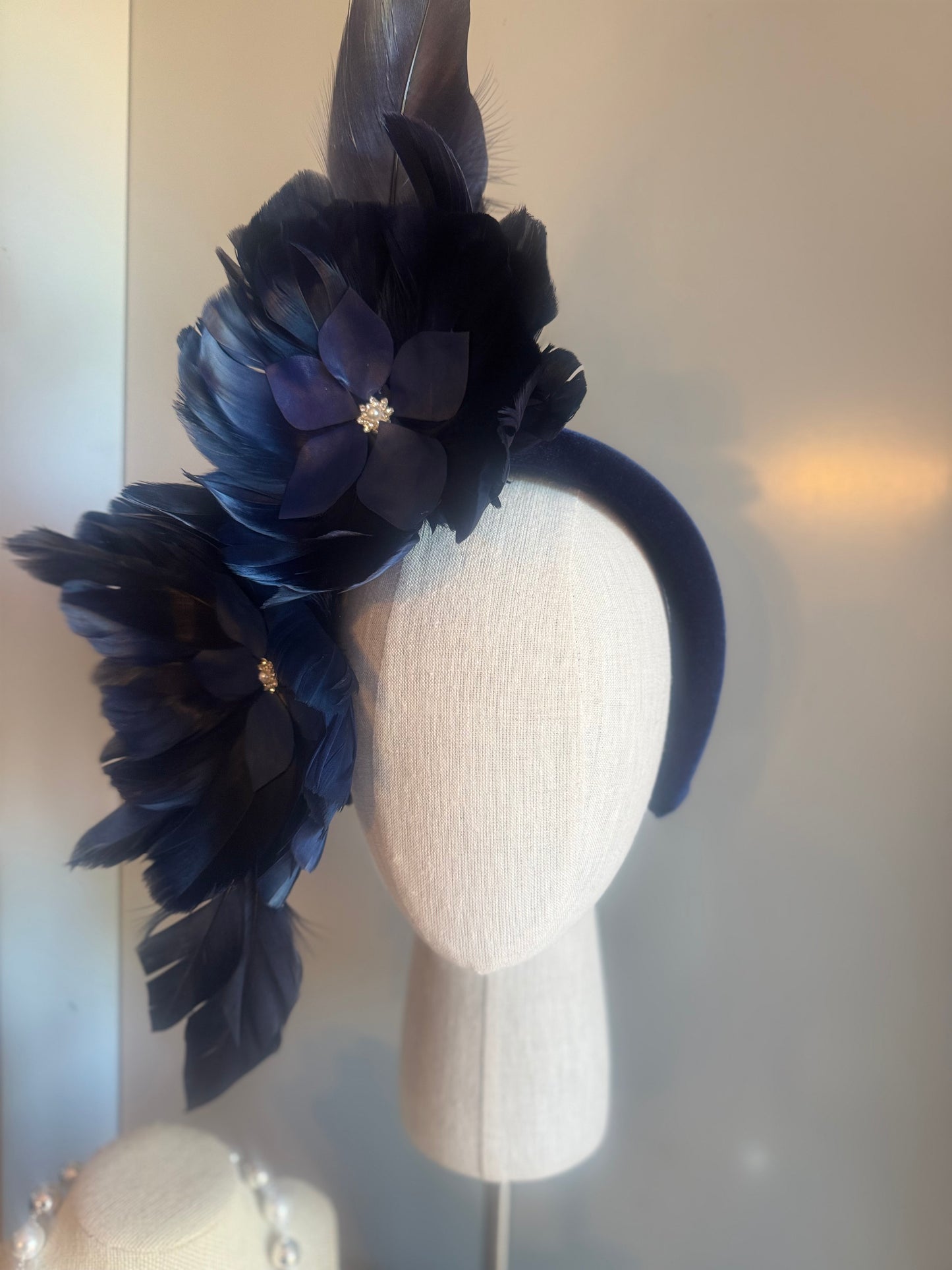 “Maggie” Navy feather statement