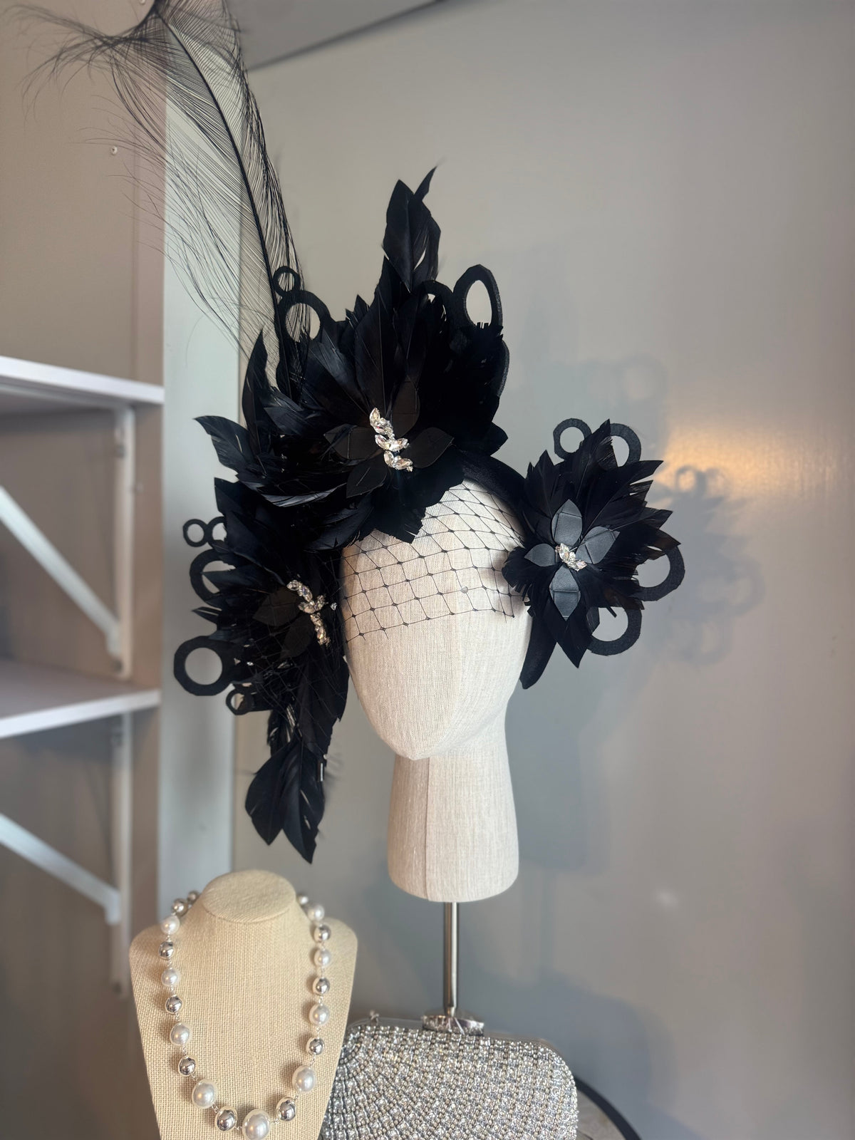 “Odette” Black and silver feather statement