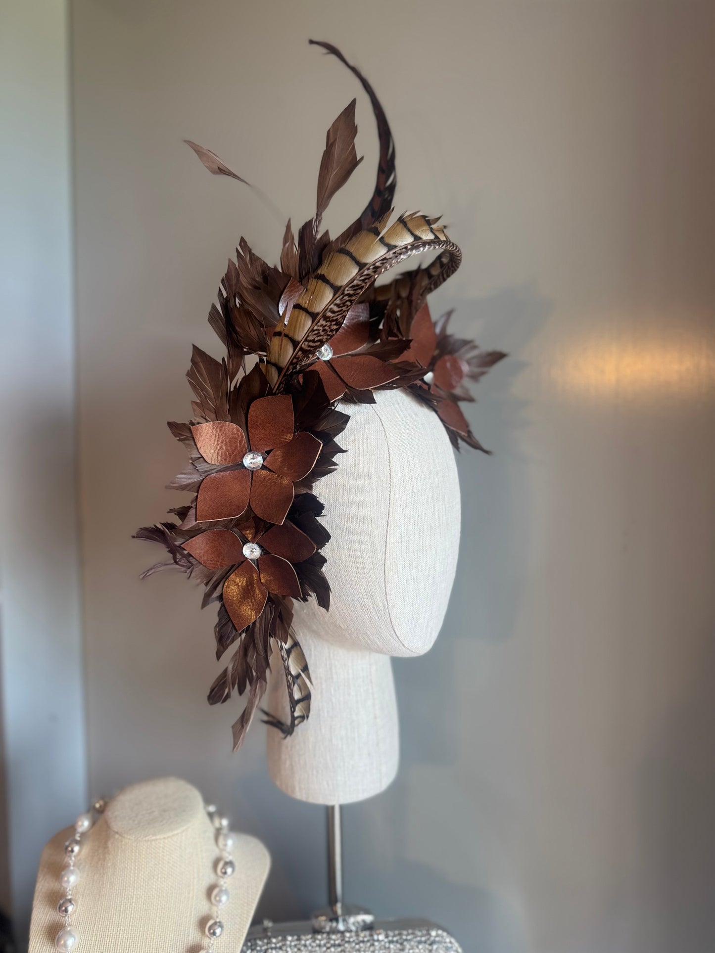 “Tempi” brown feather statement pillbox