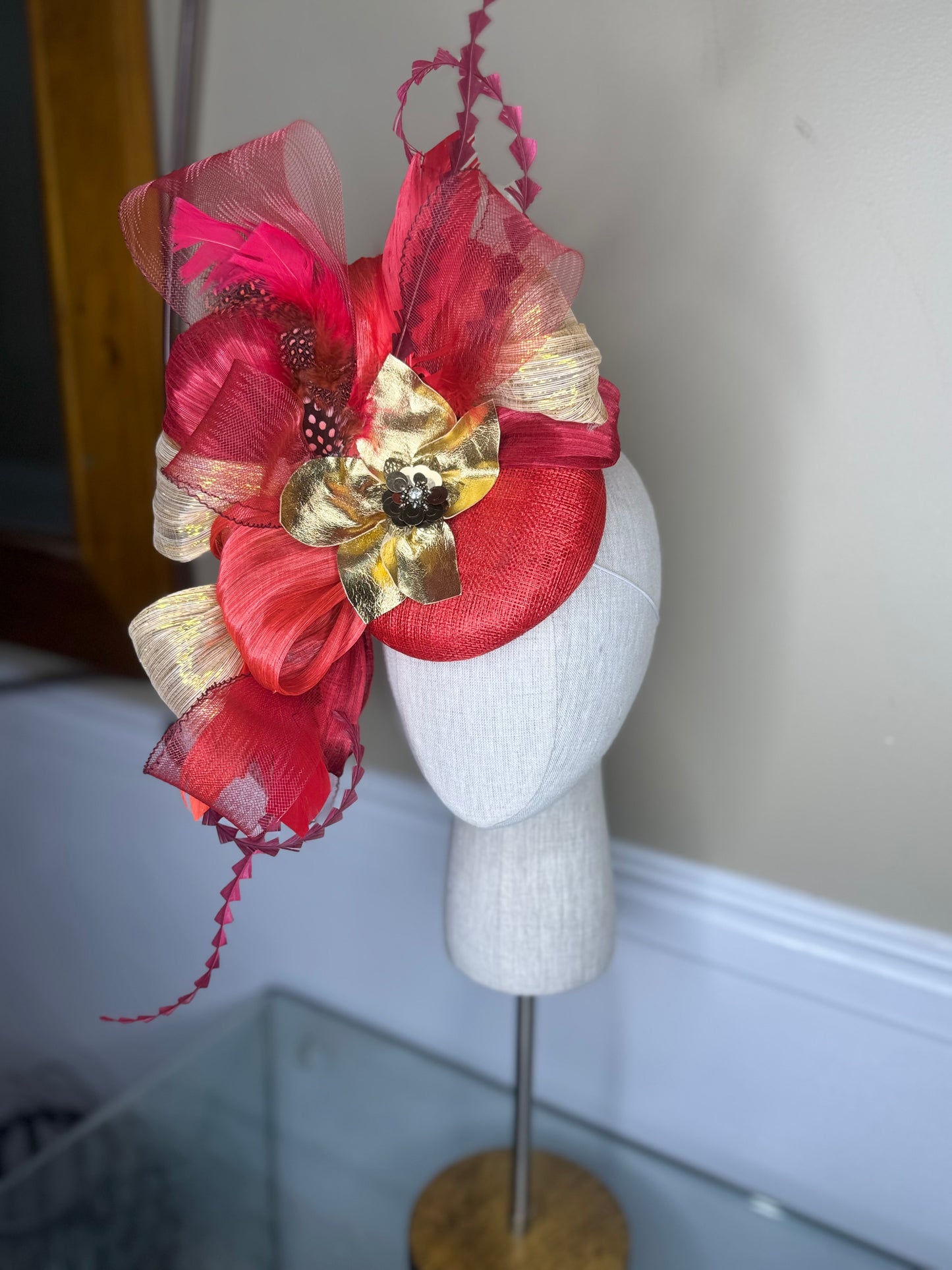“Lucia” shades of red & gold statement fascinator