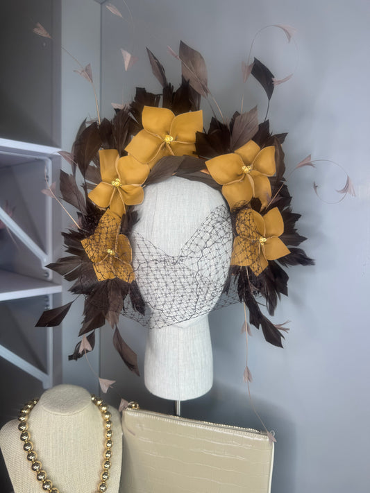 “Pippa” caramel mustard & chocolate leather & feather statement