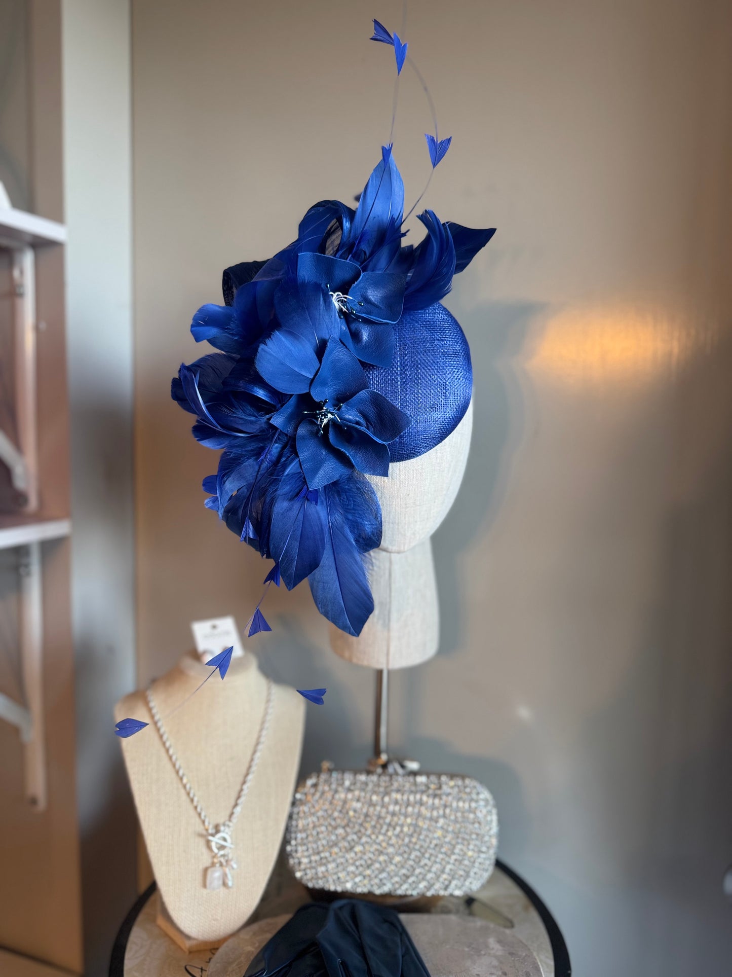 “Felicity” Blue feather & leather floral