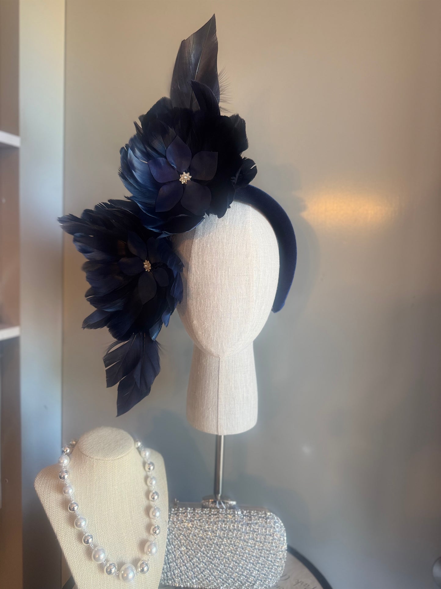 “Maggie” Navy feather statement