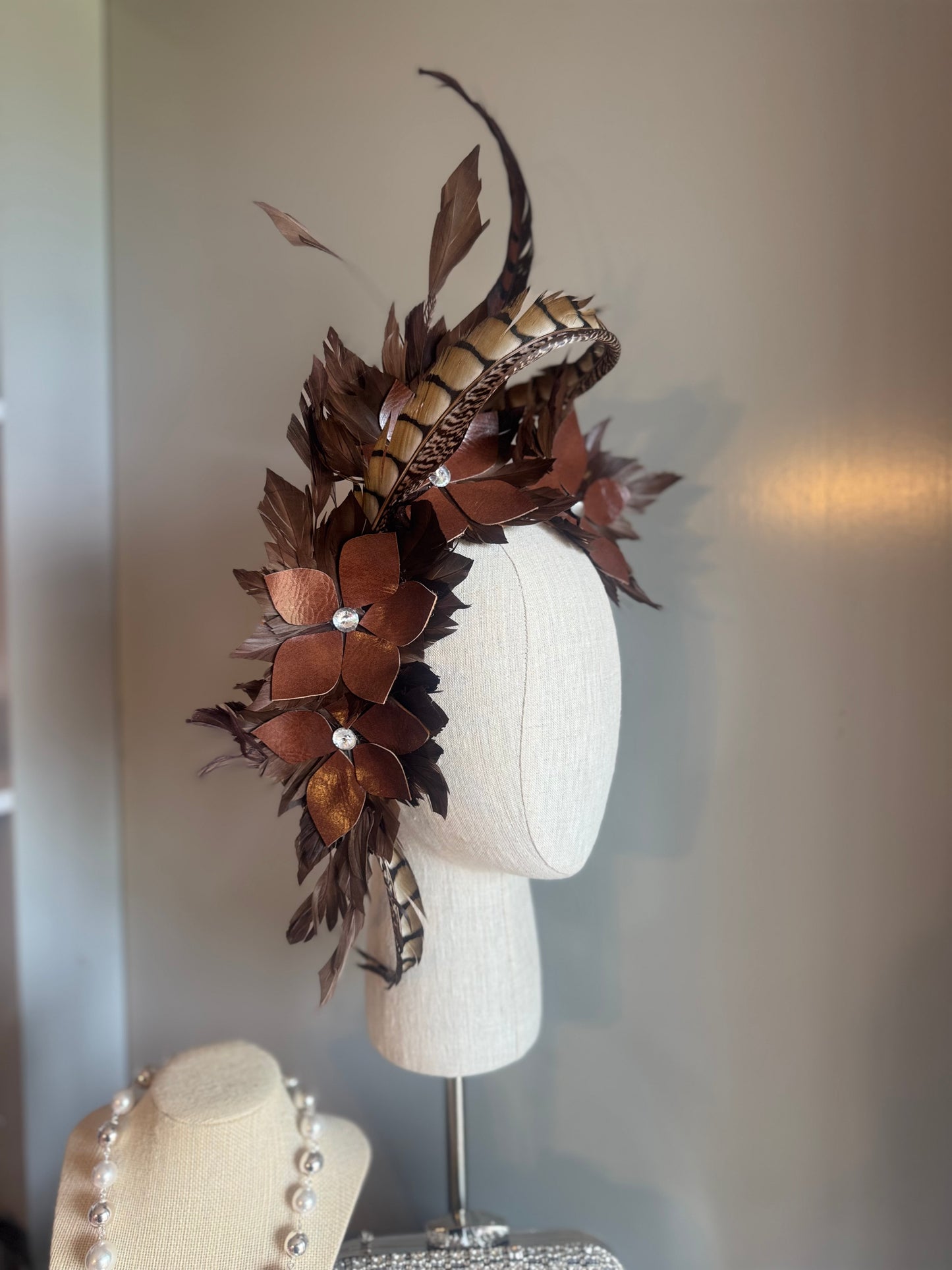 “Tempi” brown feather statement pillbox