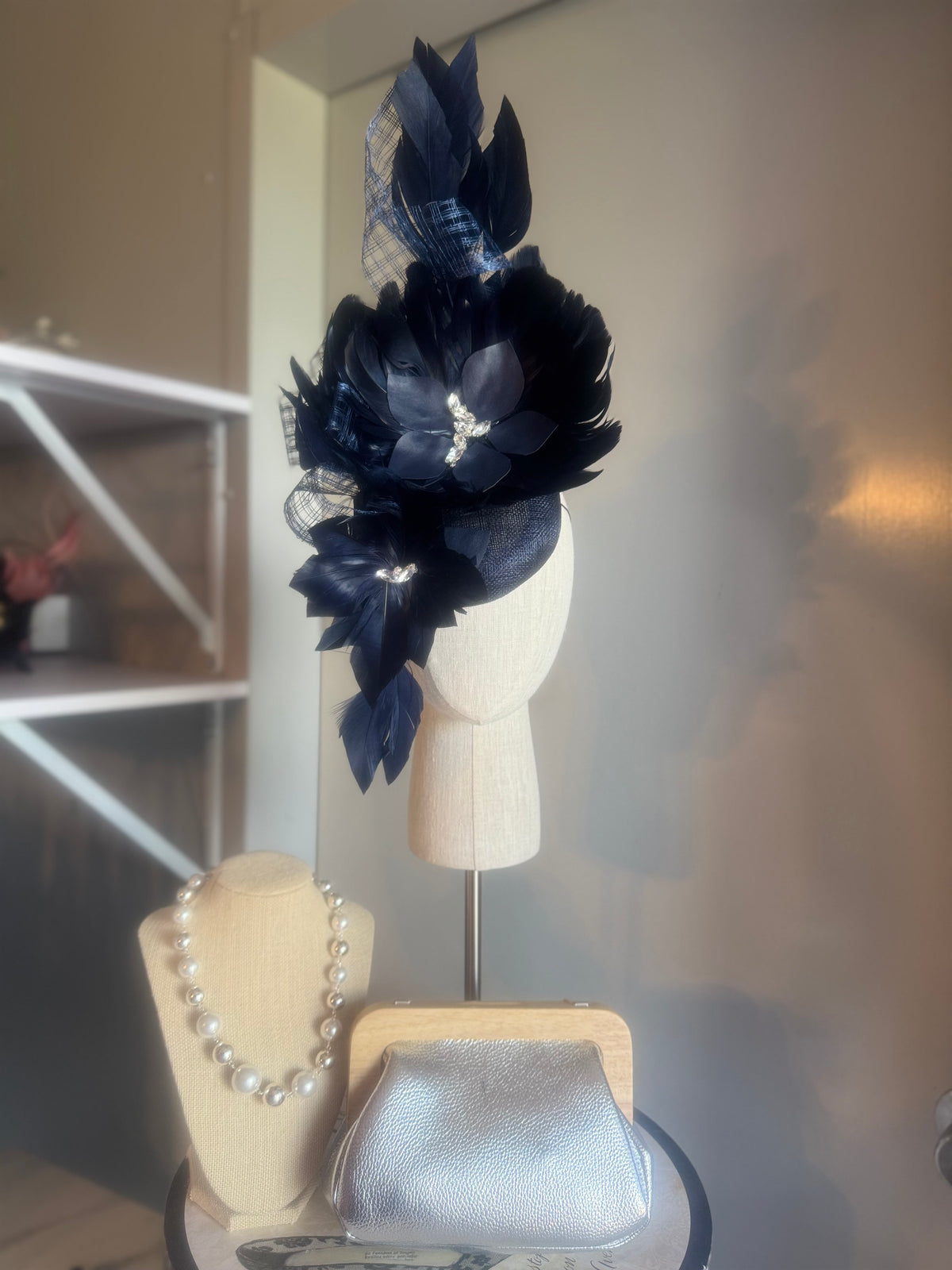 “Maddie” Navy feather statement