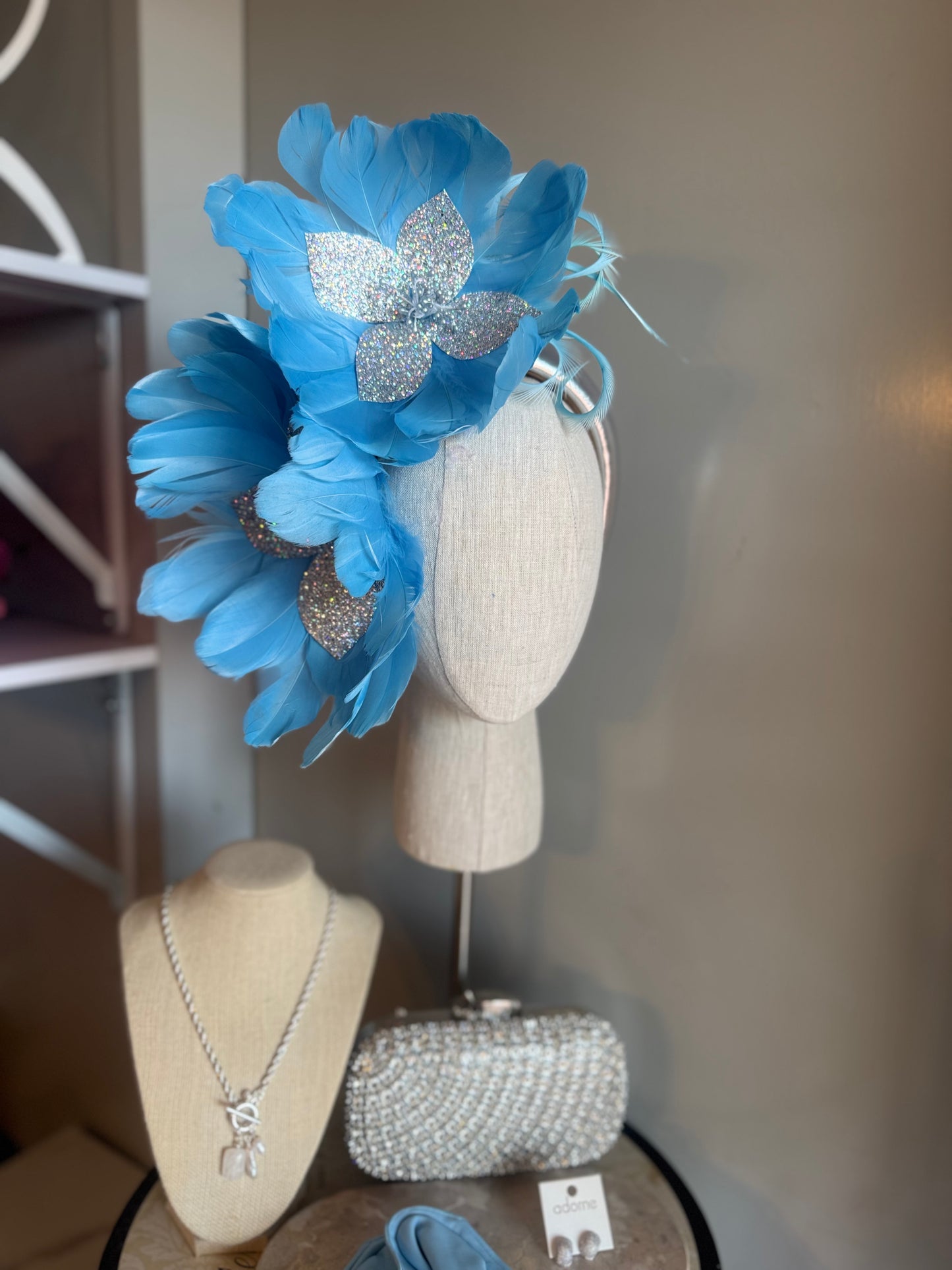 “Jeanada” baby blue & silver feather statement