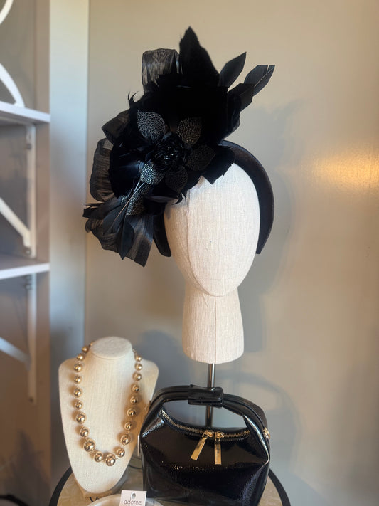 “Temple” black feather statement