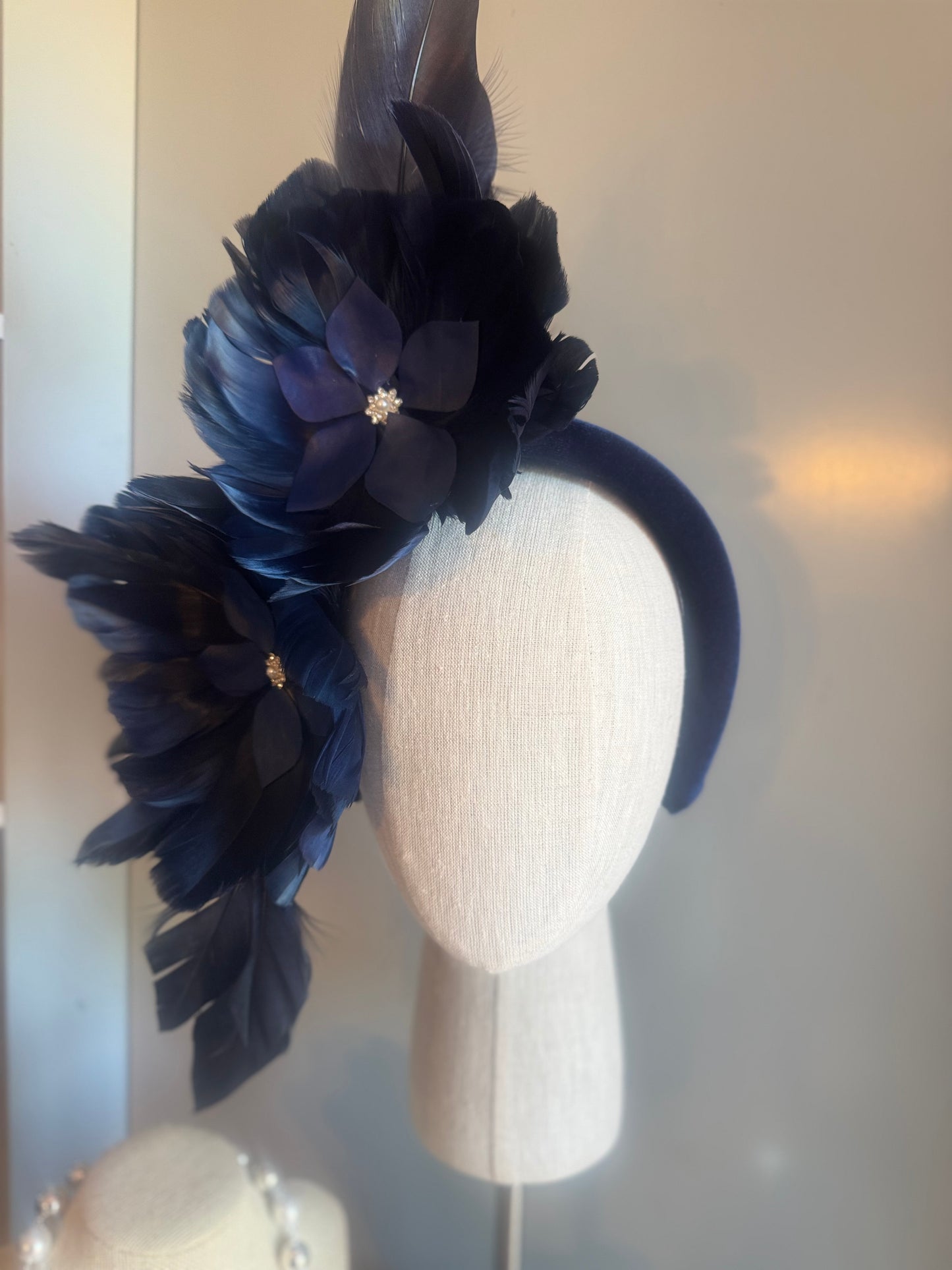 “Maggie” Navy feather statement