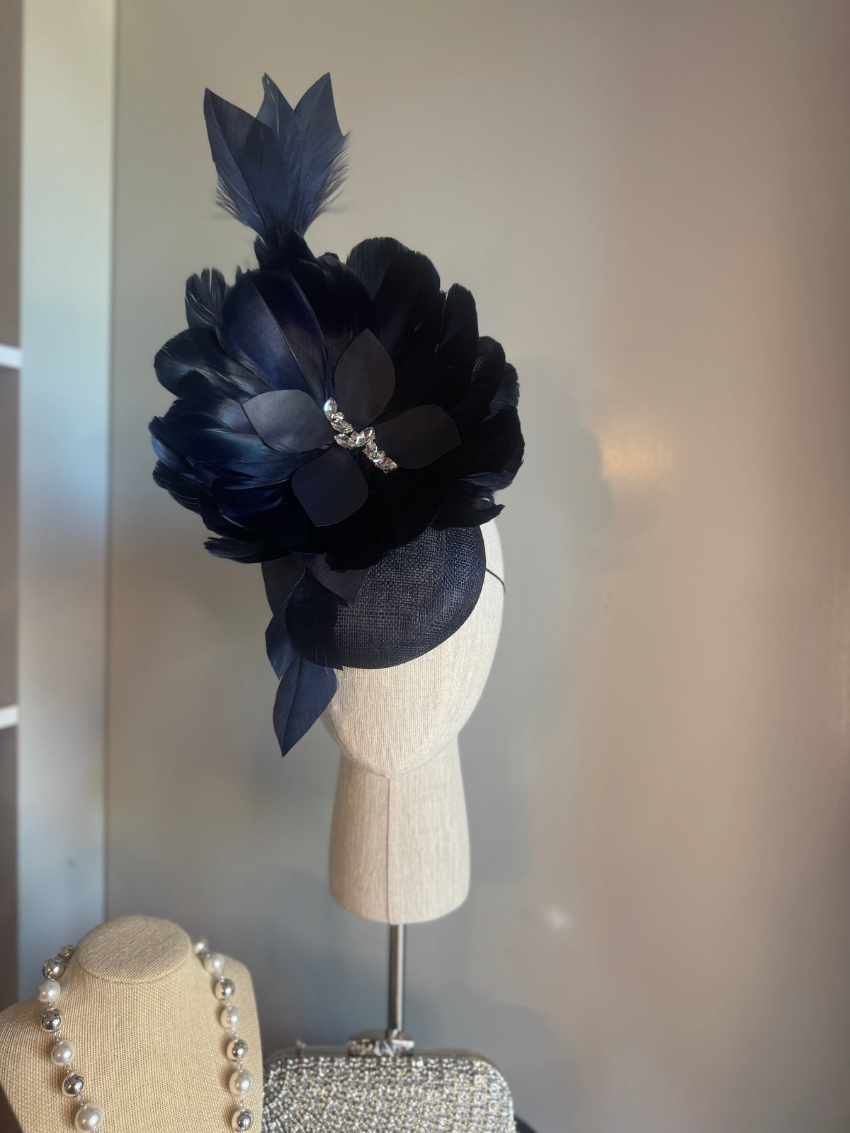 “Alison” Navy feather statement