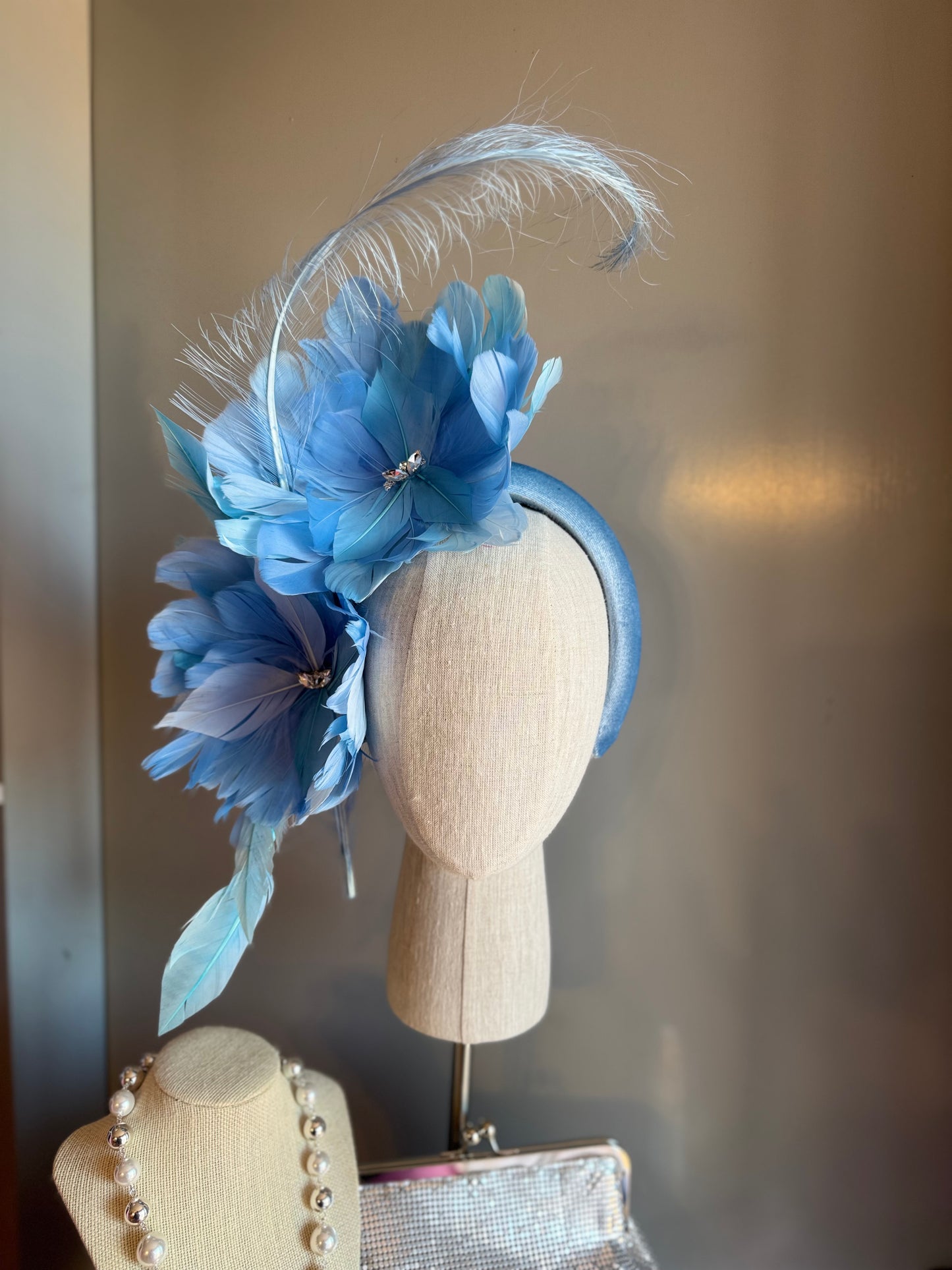“Gracie” blue feather statement
