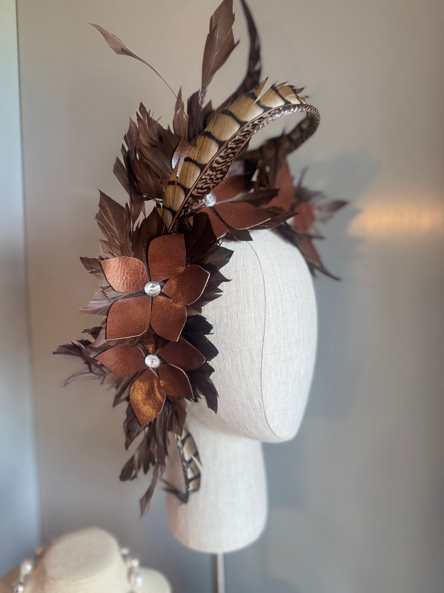 “Tempi” brown feather statement pillbox