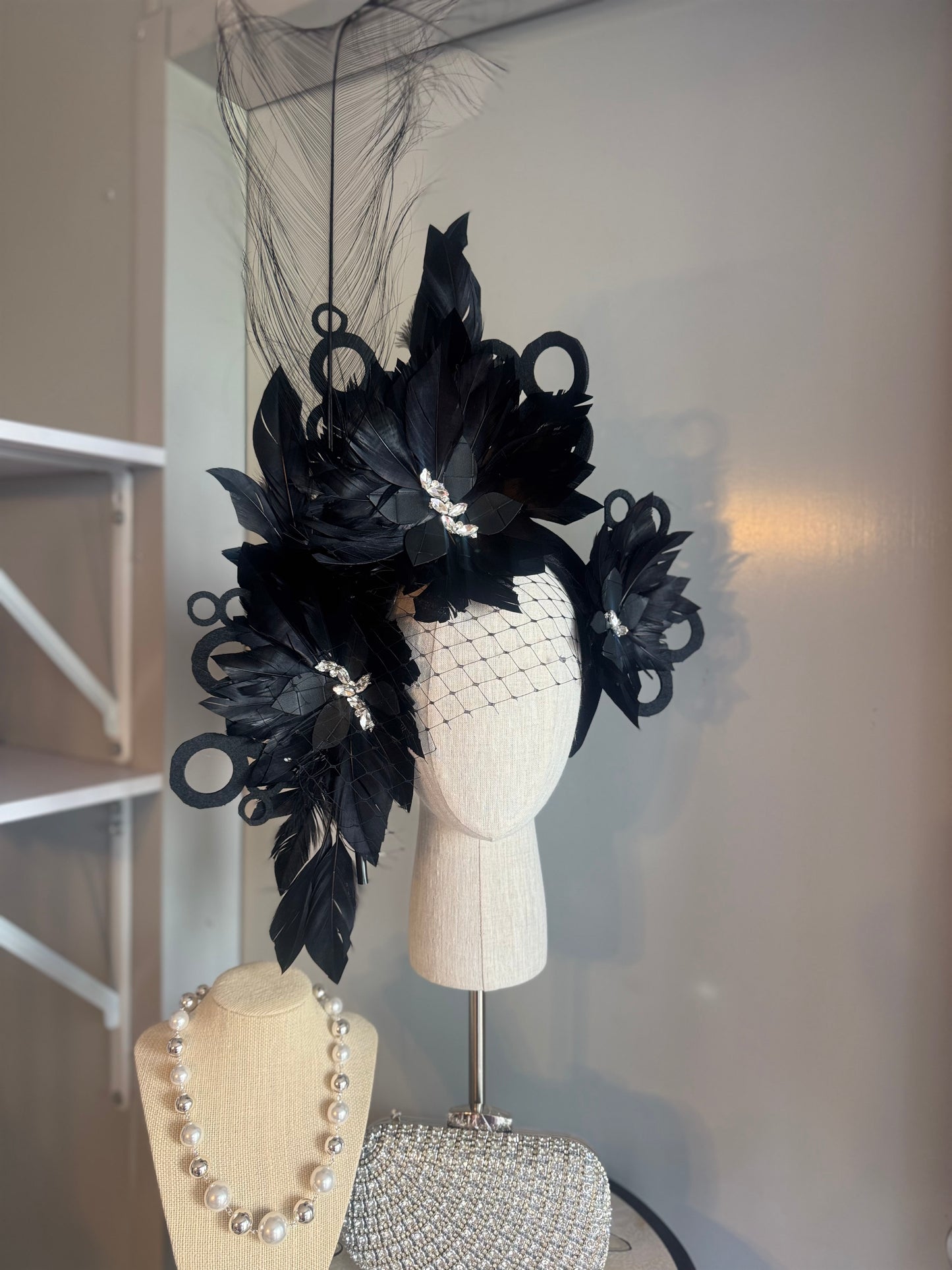 “Odette” Black and silver feather statement