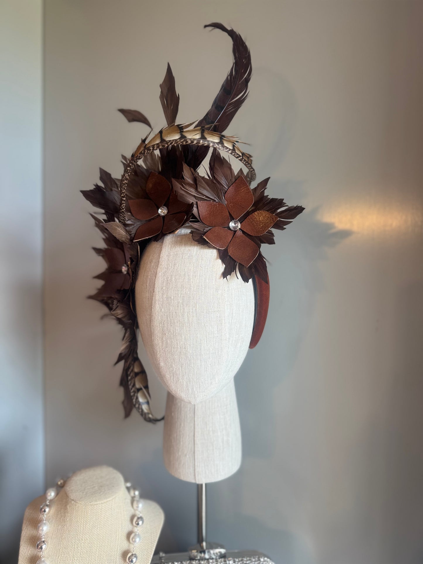 “Tempi” brown feather statement pillbox