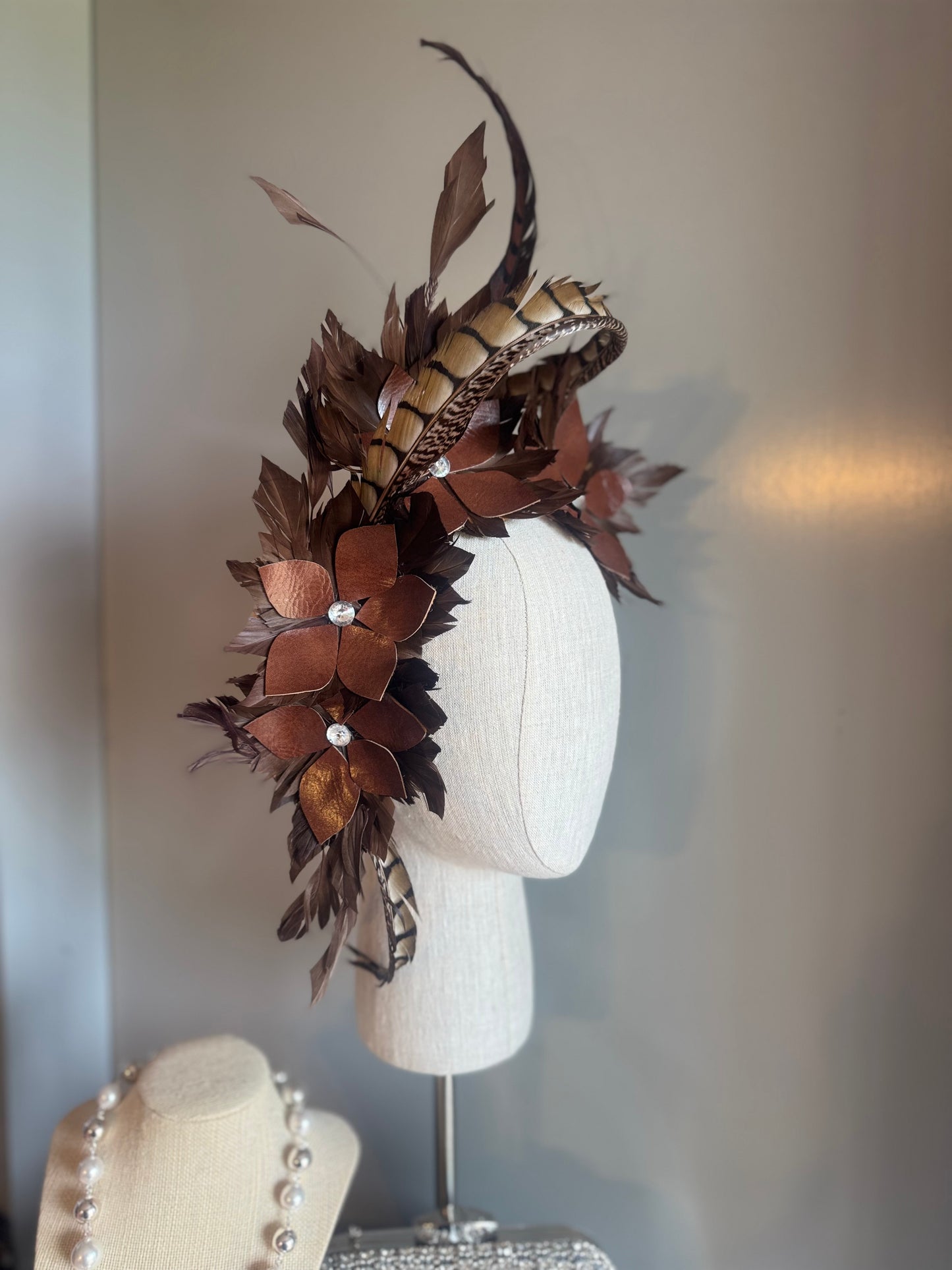 “Tempi” brown feather statement pillbox