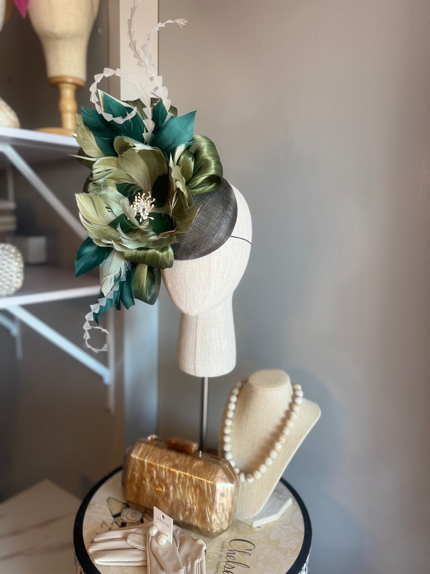 “August” green feather statement