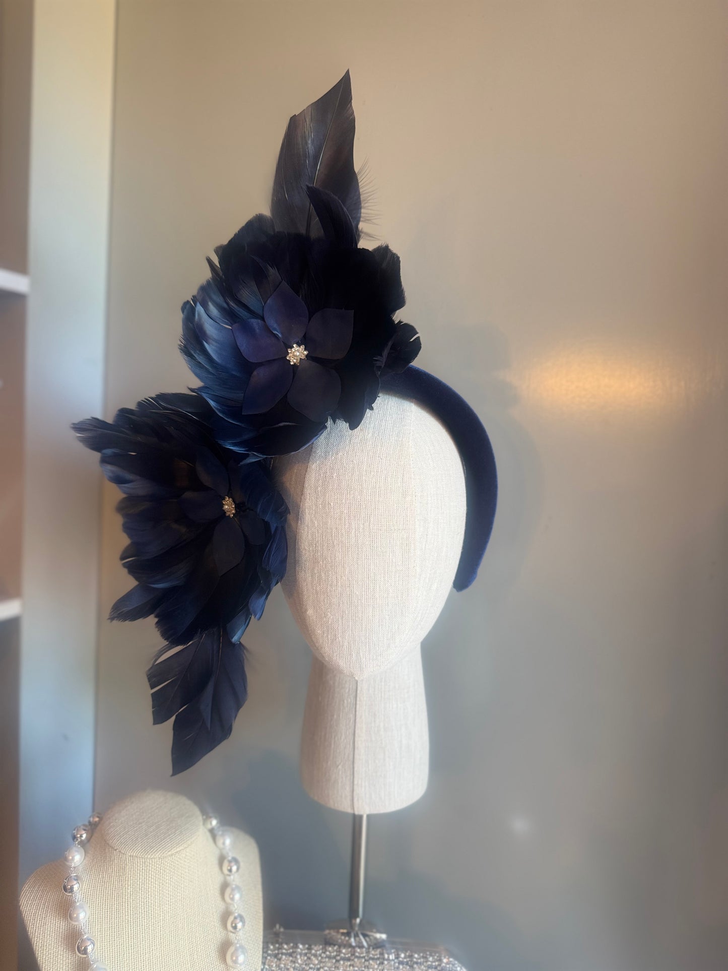 “Maggie” Navy feather statement