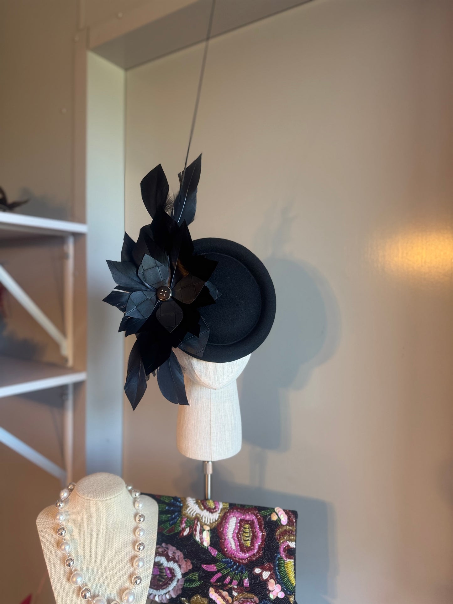 “Toni” black feather statement