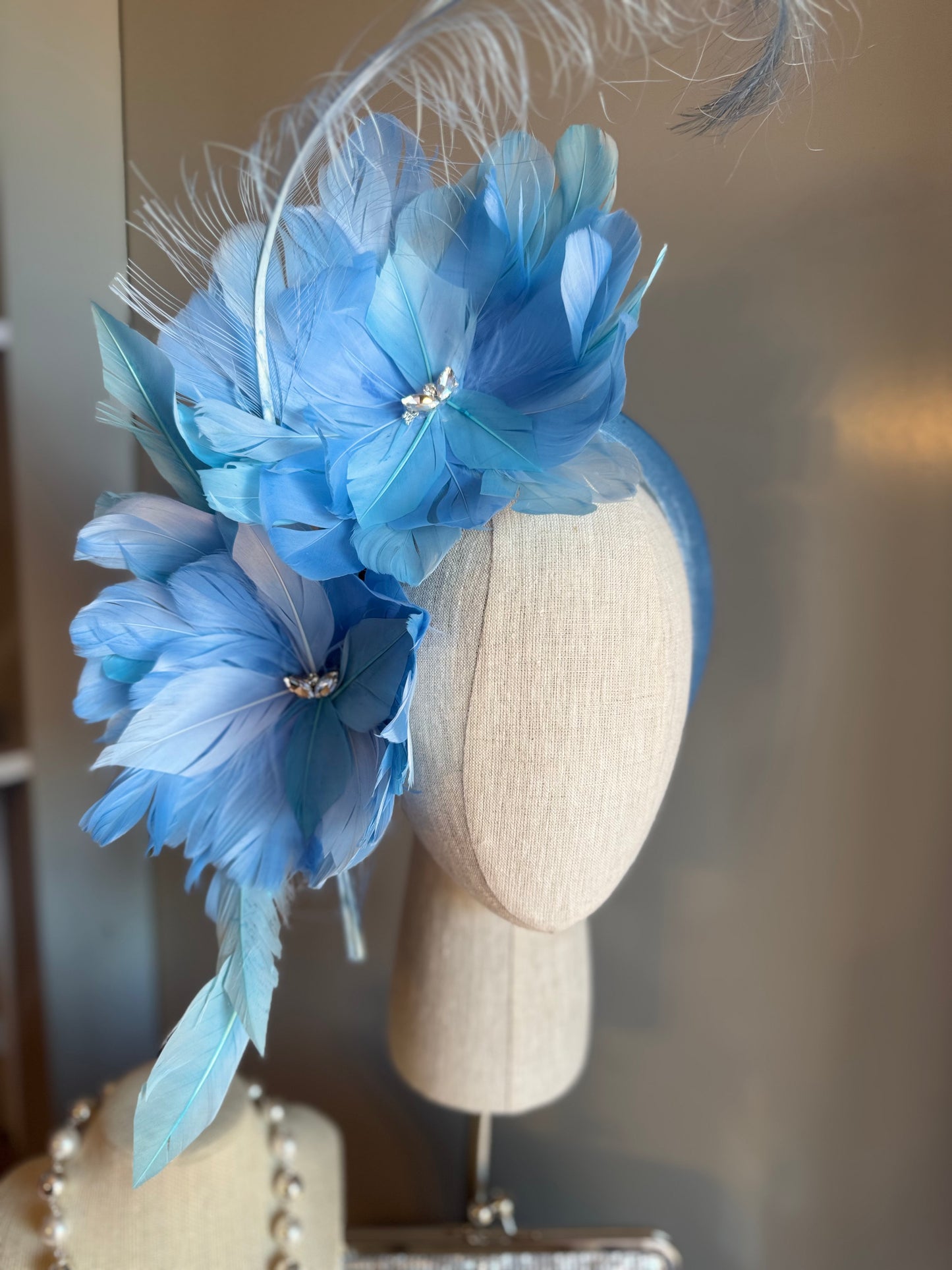 “Gracie” blue feather statement
