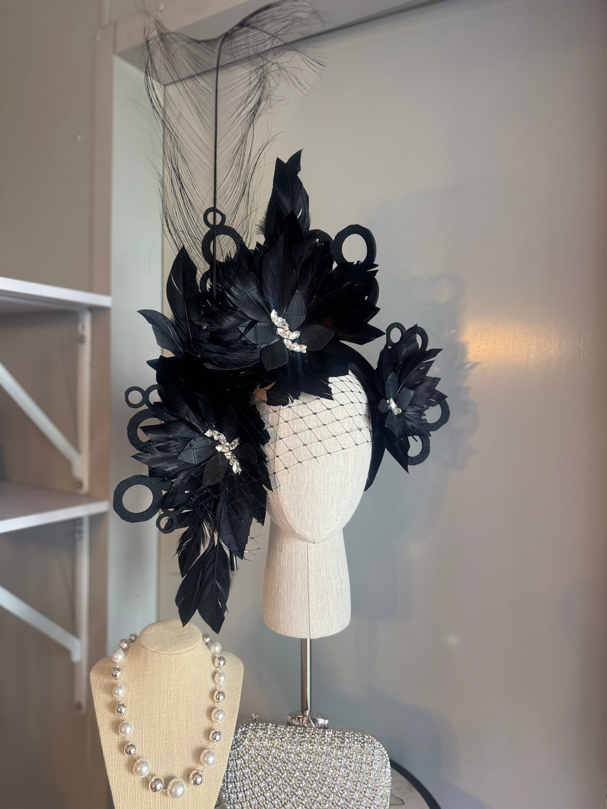 “Odette” Black and silver feather statement
