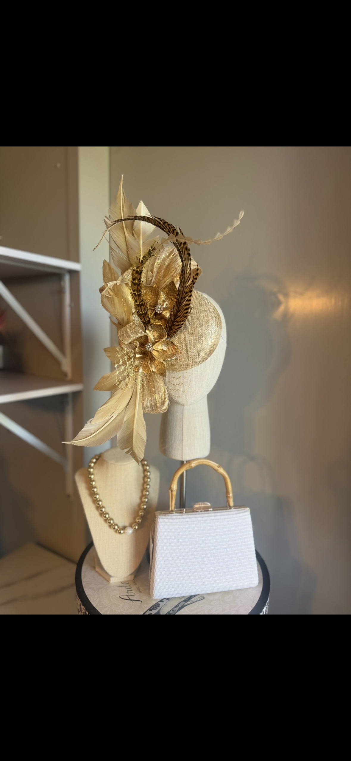 “Isabella” Gold feather statement