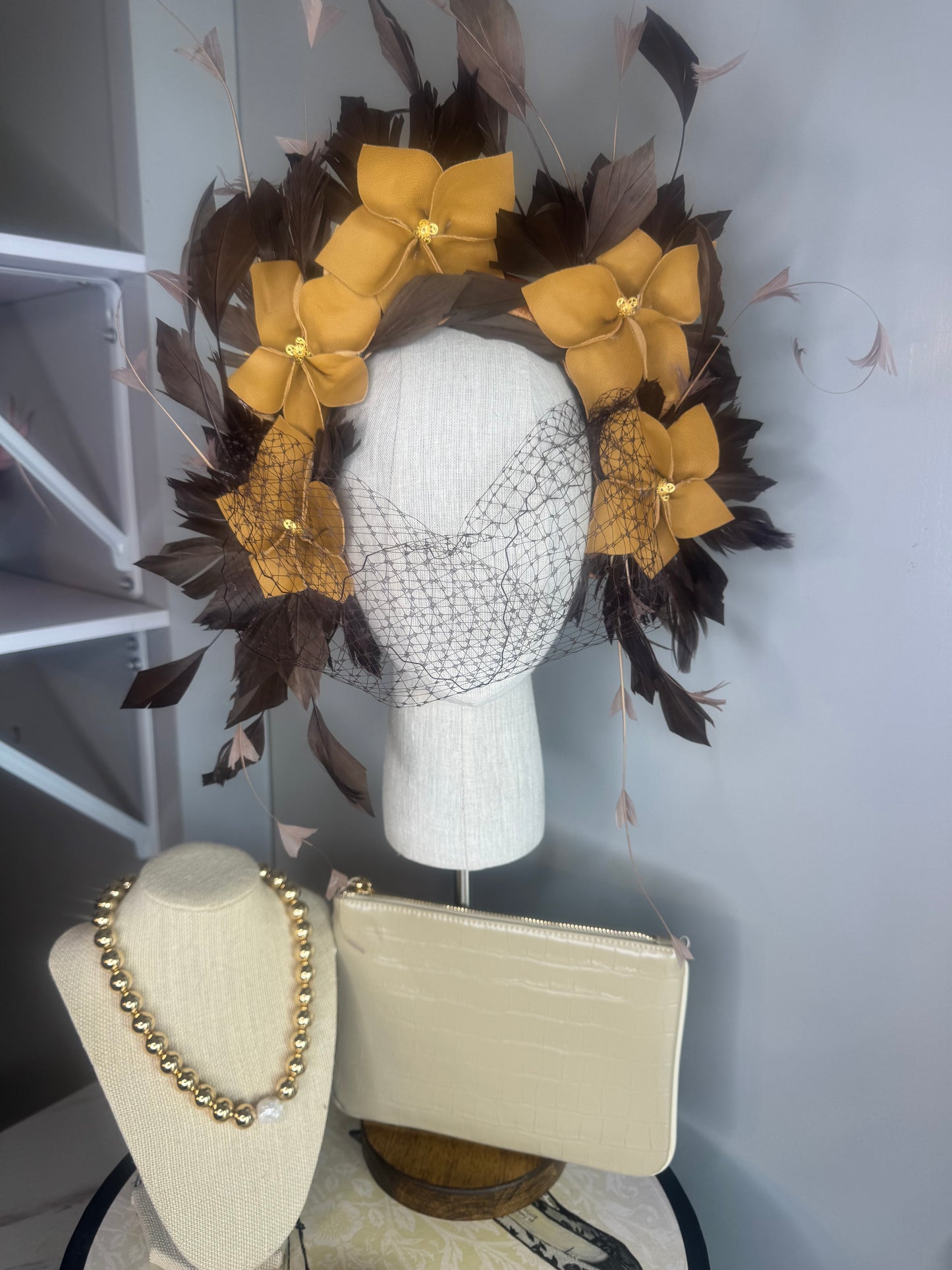 “Pippa” caramel mustard & chocolate leather & feather statement