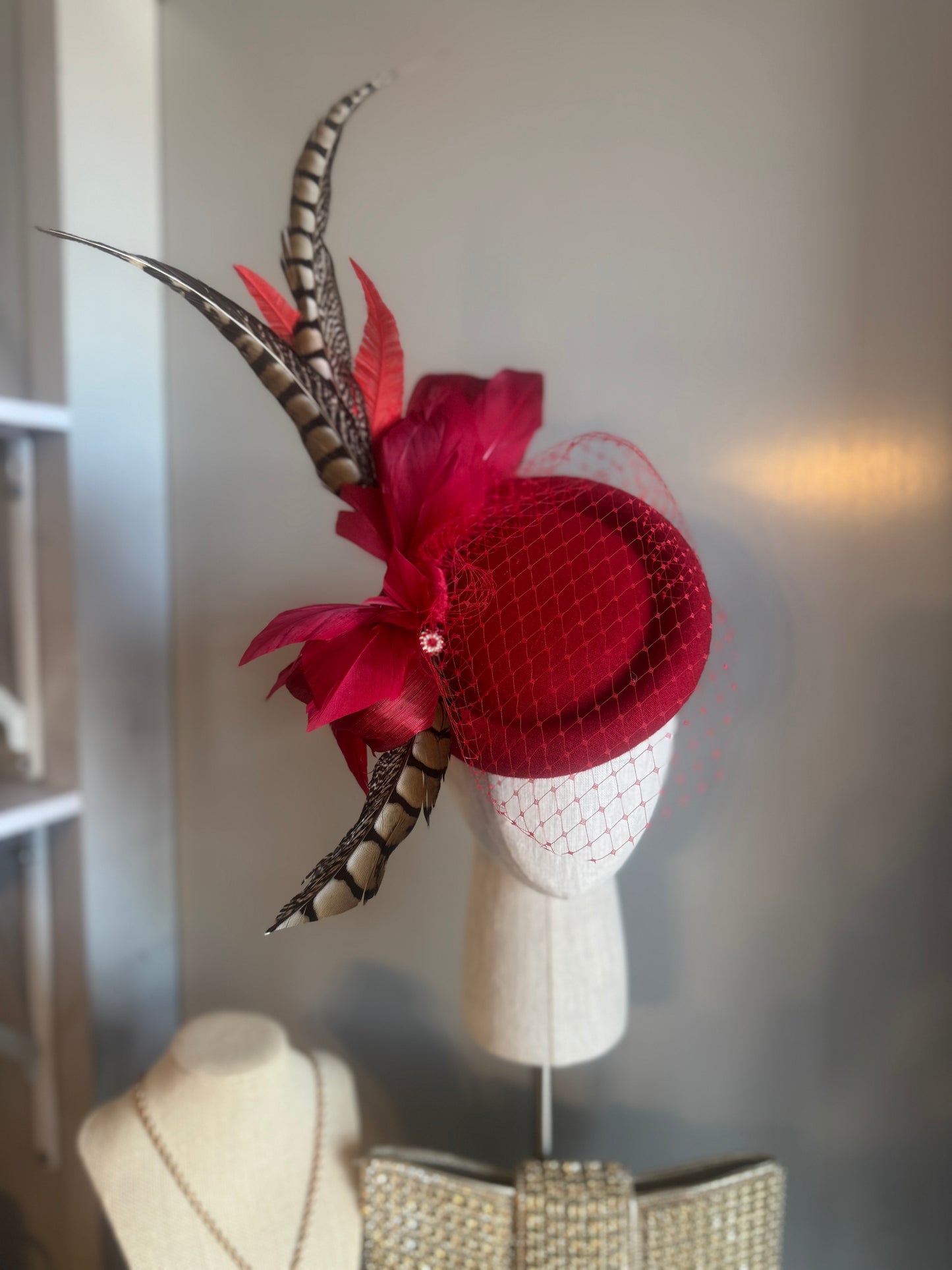 “Jaclyn” red feather statement