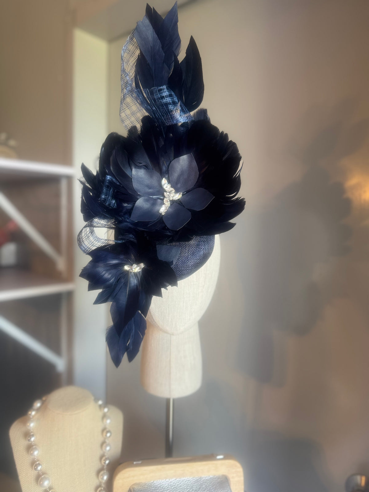 “Maddie” Navy feather statement